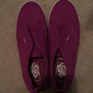 Purple vans. Never worn. Needs shoe laces. 7.5